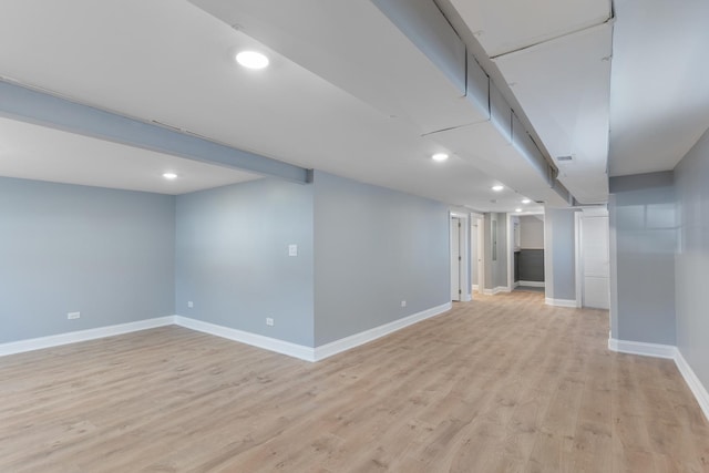 basement with light wood-type flooring