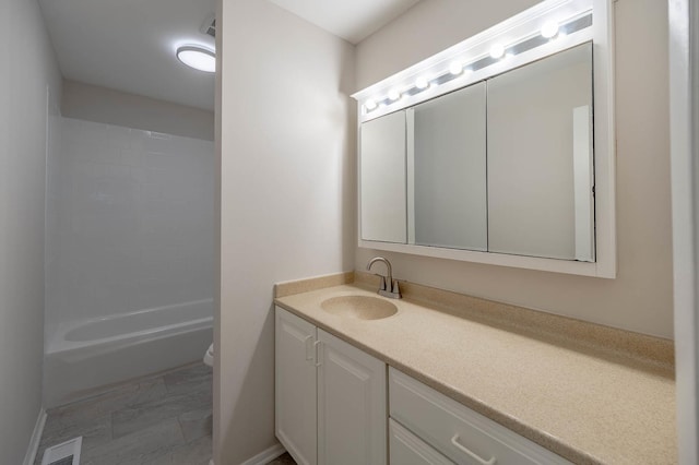 full bathroom with tile patterned flooring, vanity, toilet, and bathtub / shower combination