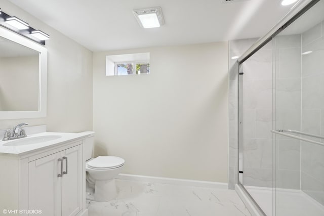 bathroom with vanity, toilet, and an enclosed shower