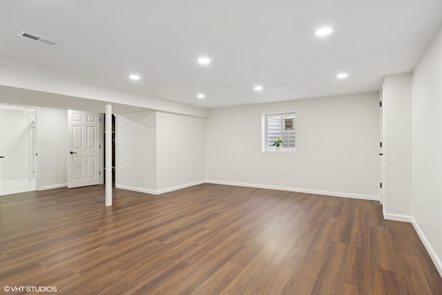 basement featuring dark wood-type flooring