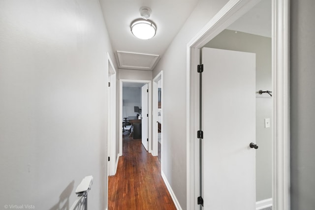 corridor featuring dark wood-type flooring