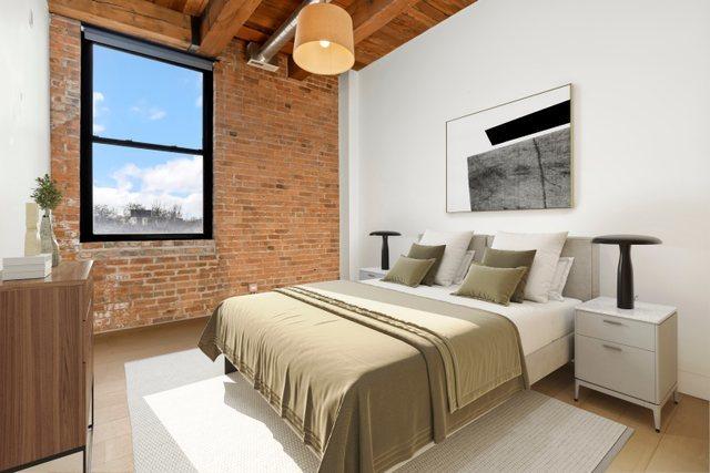 bedroom with brick wall, light hardwood / wood-style flooring, beam ceiling, and wood ceiling