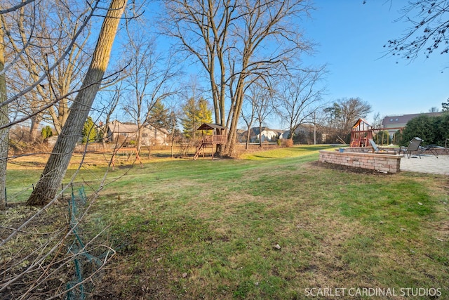 view of yard featuring a playground