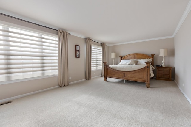 bedroom featuring light colored carpet and ornamental molding