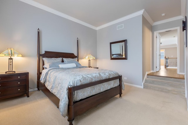 carpeted bedroom featuring ornamental molding