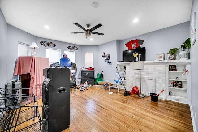 game room featuring ceiling fan and hardwood / wood-style flooring