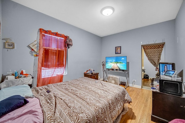 bedroom featuring hardwood / wood-style flooring