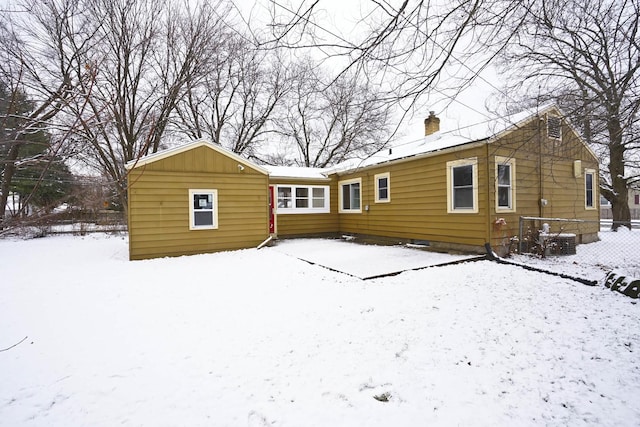 view of snow covered house