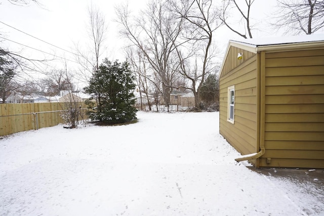 view of yard covered in snow