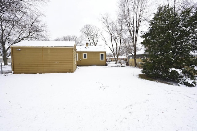 view of yard covered in snow