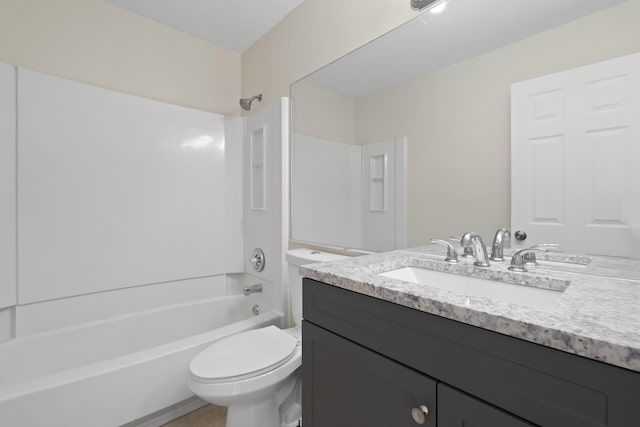 full bathroom with vanity, tub / shower combination, and toilet