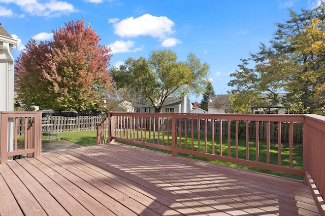 deck featuring a lawn