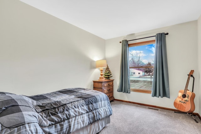 bedroom with light carpet