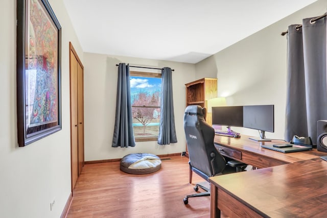 office area with light wood-type flooring