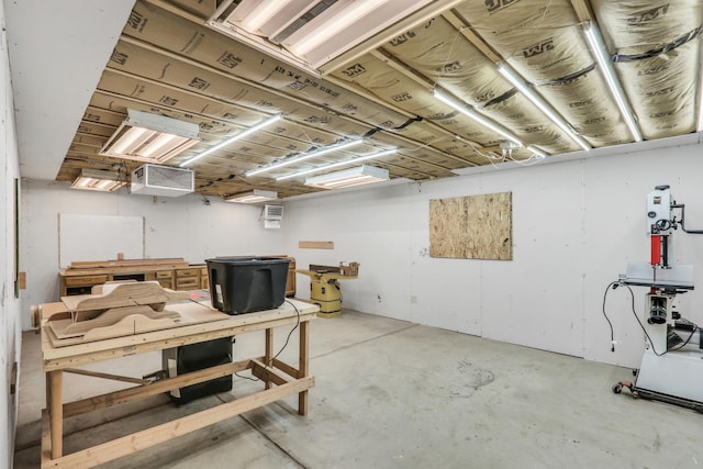 basement with a workshop area