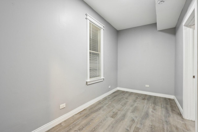 empty room with light wood-type flooring