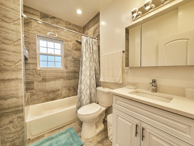 full bathroom with shower / tub combo, vanity, and toilet