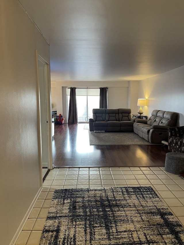 living room with light tile patterned floors