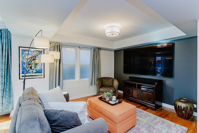 living room featuring ornamental molding and hardwood / wood-style flooring