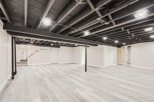 basement with wood-type flooring