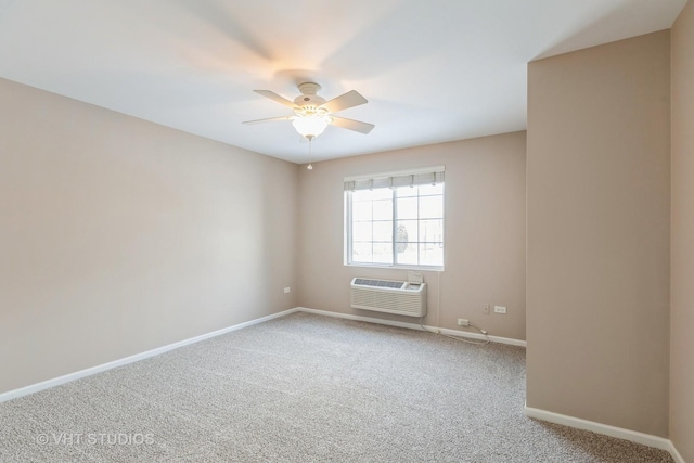 carpeted empty room featuring a wall unit AC and ceiling fan