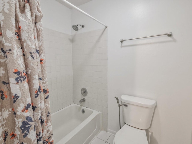 bathroom featuring tile patterned floors, shower / bath combo, and toilet