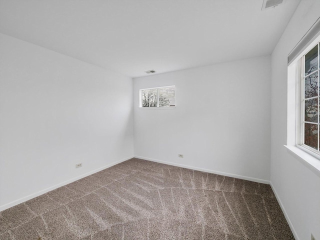 spare room with carpet flooring