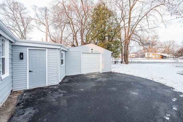 view of snow covered garage