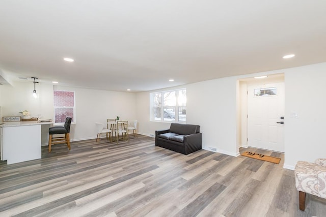 sitting room featuring light hardwood / wood-style floors