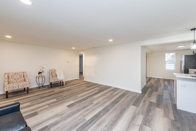 unfurnished room featuring hardwood / wood-style flooring