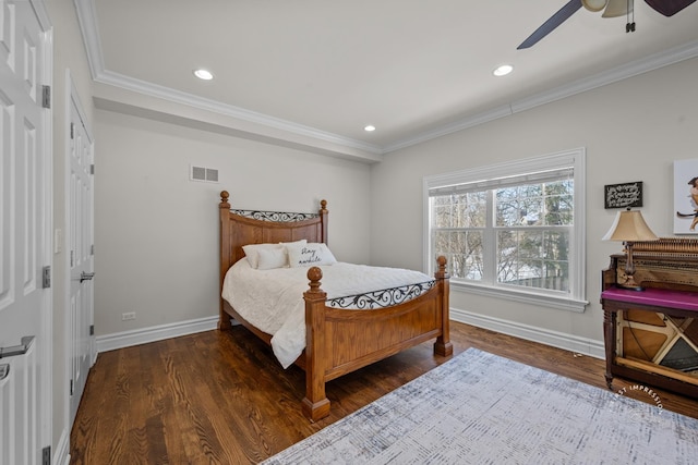 bedroom featuring ornamental molding, visible vents, and dark wood-type flooring