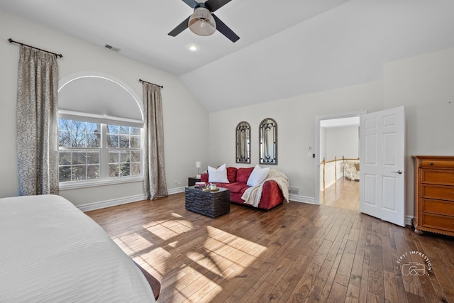 bedroom with visible vents, baseboards, dark wood finished floors, lofted ceiling, and ceiling fan