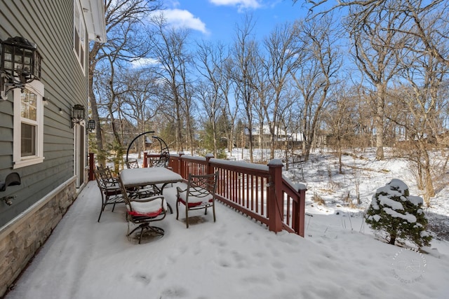 view of snow covered deck