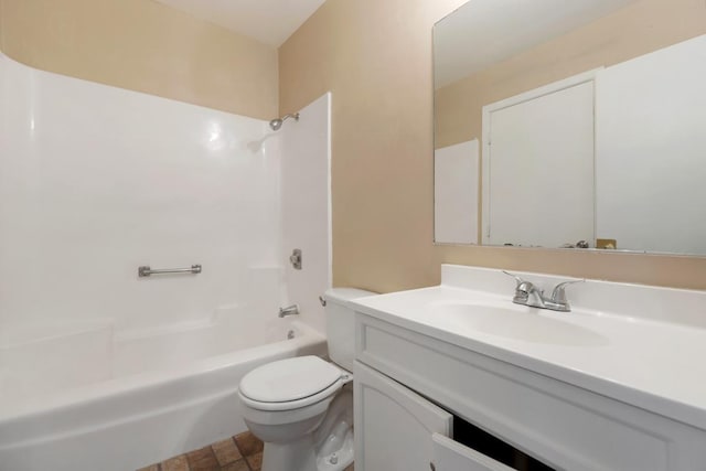 full bathroom with washtub / shower combination, vanity, and toilet