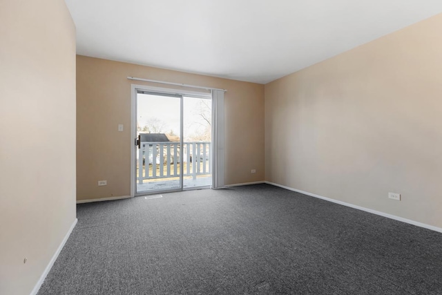 spare room with carpet flooring