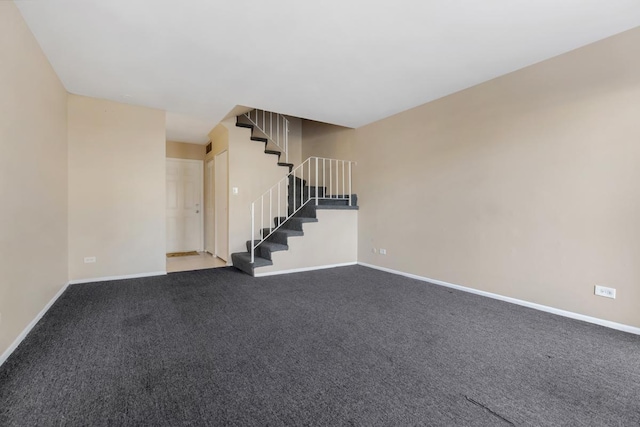 empty room featuring carpet flooring