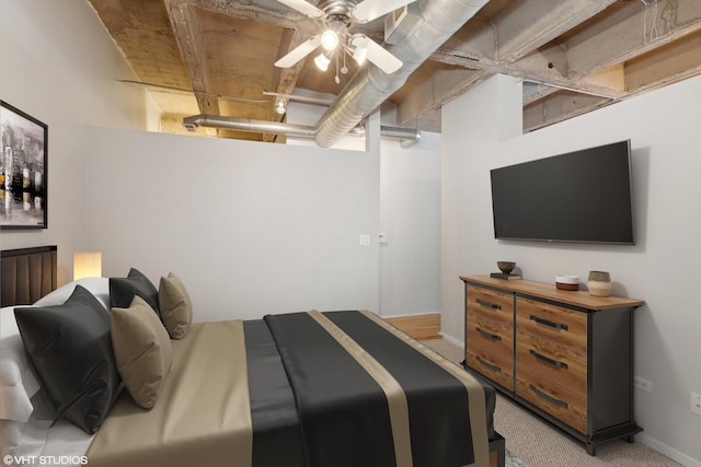 bedroom featuring light carpet and ceiling fan