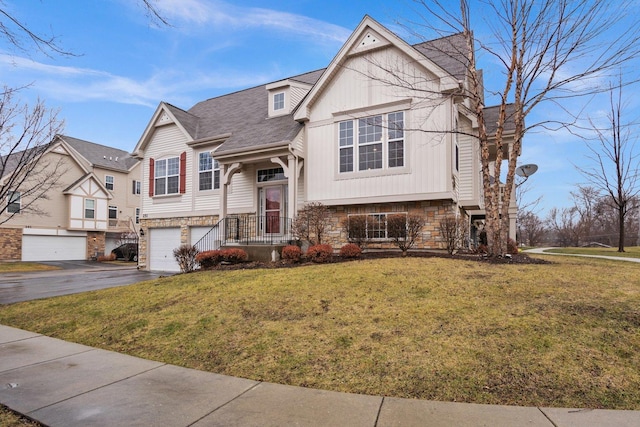 view of front facade featuring a front lawn and a garage