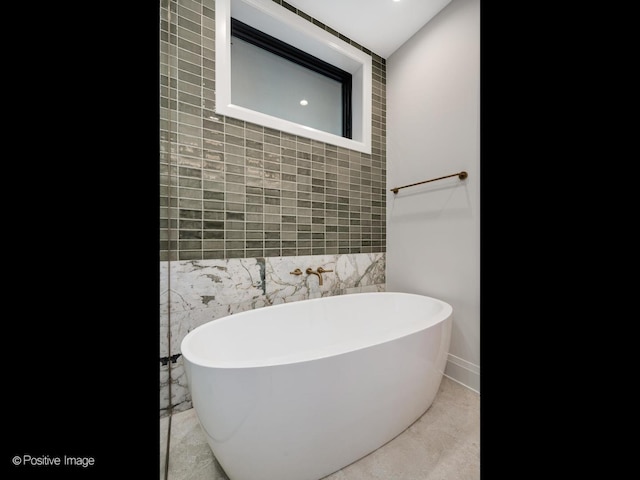 1208 W Wellington St Unit 1F, Chicago, IL 60657 - full bathroom with baseboards and a freestanding tub