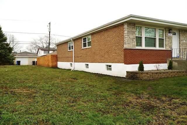 view of property exterior with a lawn