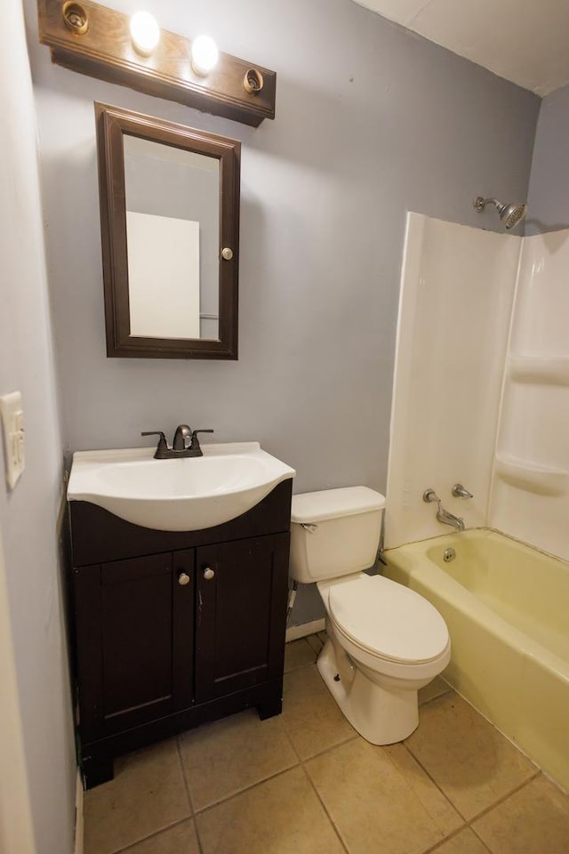 full bathroom with tile patterned floors, vanity, toilet, and tub / shower combination