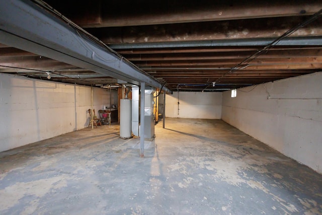 basement featuring gas water heater