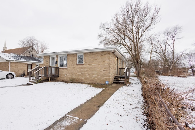 view of snow covered property