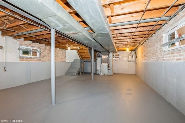 basement featuring gas water heater