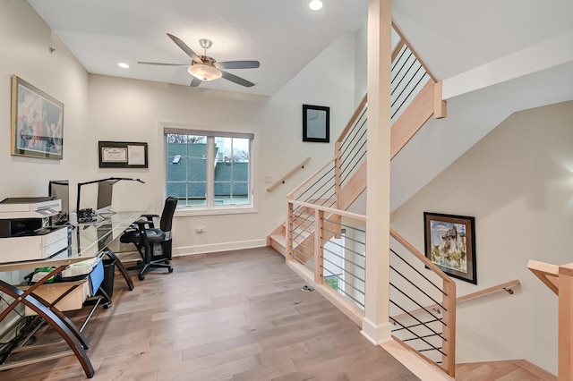 office space with hardwood / wood-style flooring and ceiling fan