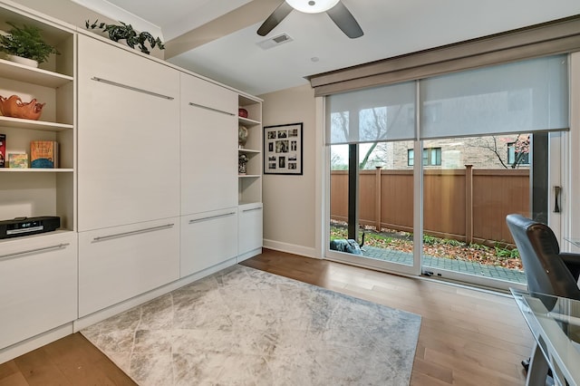 interior space with ceiling fan and light hardwood / wood-style flooring