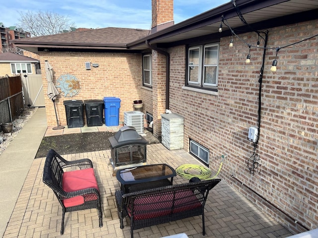 view of patio with central AC unit