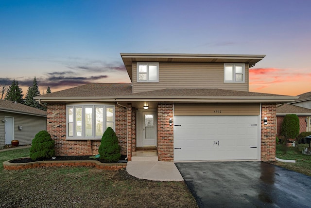 view of front of house with a garage