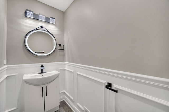 bathroom featuring sink and wood-type flooring