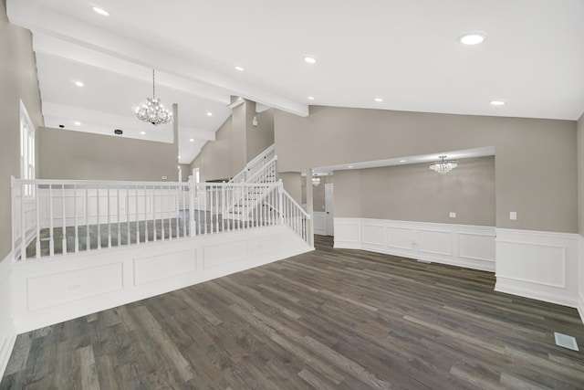 interior space with lofted ceiling and dark wood-type flooring